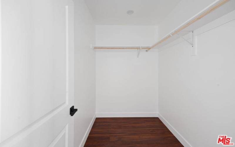 REAR HOME MASTER BEDROOM WALK IN CLOSET