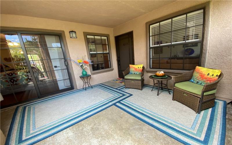 This unit features a very private covered patio behind mature landscaping.