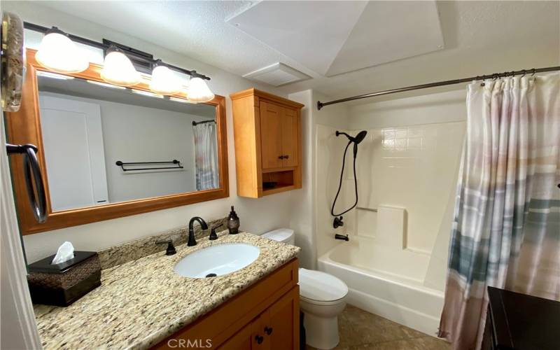 Two full bathrooms with tub and shower.