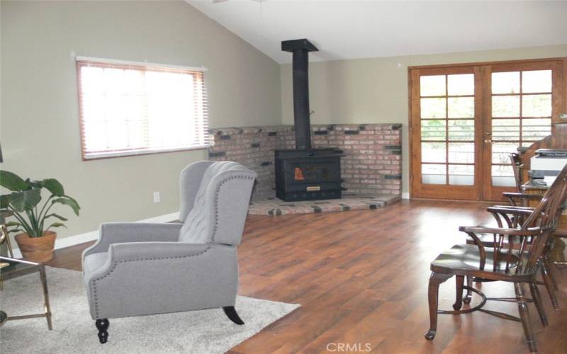 family room with wood burning stove
