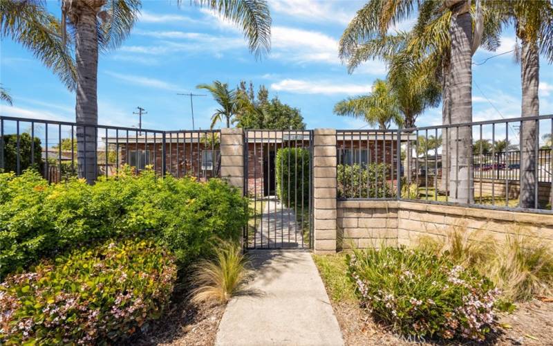 Block/wrought iron fence all around the property for privacy.