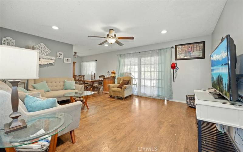 Spacious living room with recessed lighting.