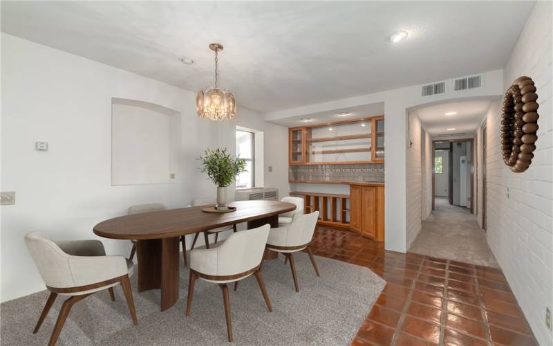 Virtually staged dining area with wet bar