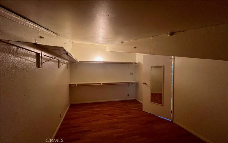 Top floor large walk in closet.