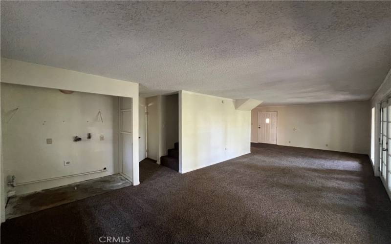 Laundry area off of living room.