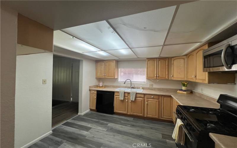 Kitchen off of dining room.