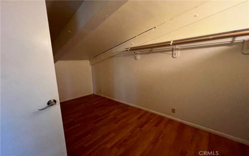 Top floor large walk in closet.