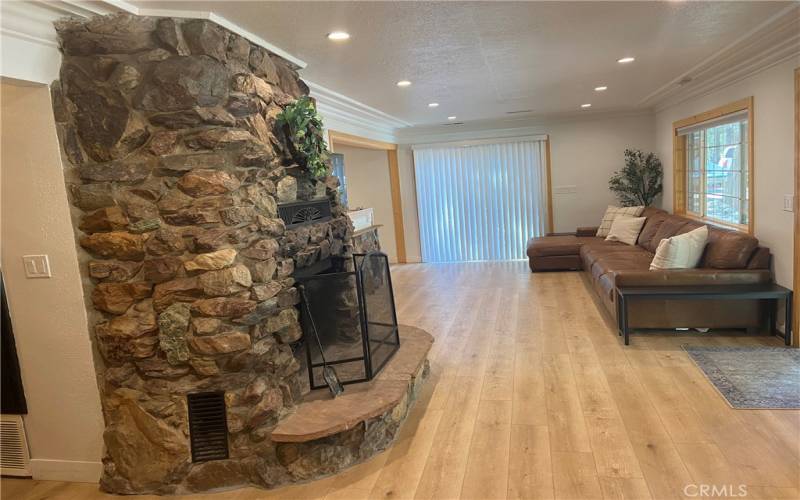 Cozy fire place for those winter fun days in the snow.  New recessed lighting & crown molding throughout this home.....