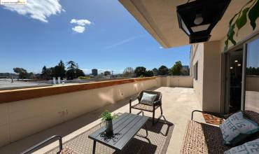 Unique Patio unlike others! Oversized above Garage so feels like a rooftop patio with Private entry