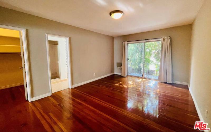 Bedroom facing Bath & closet & balcony