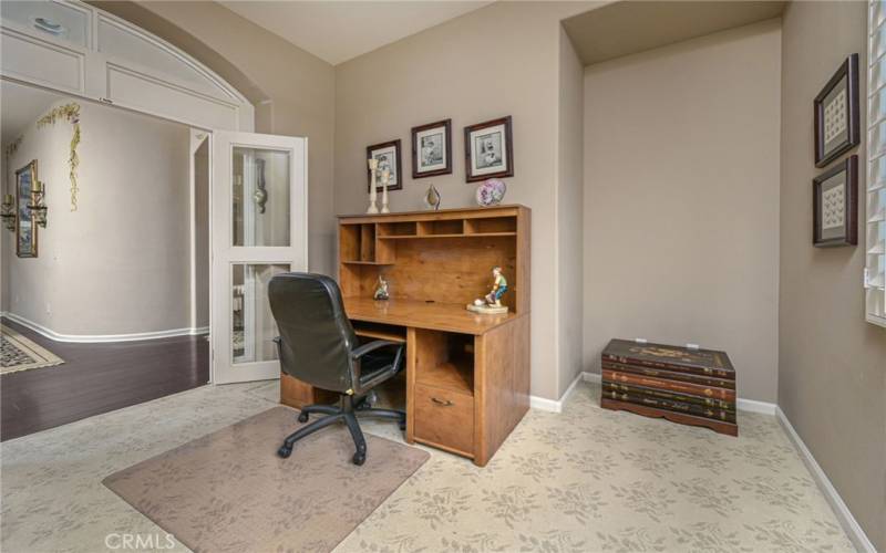 Office with custom beveled glass double doors