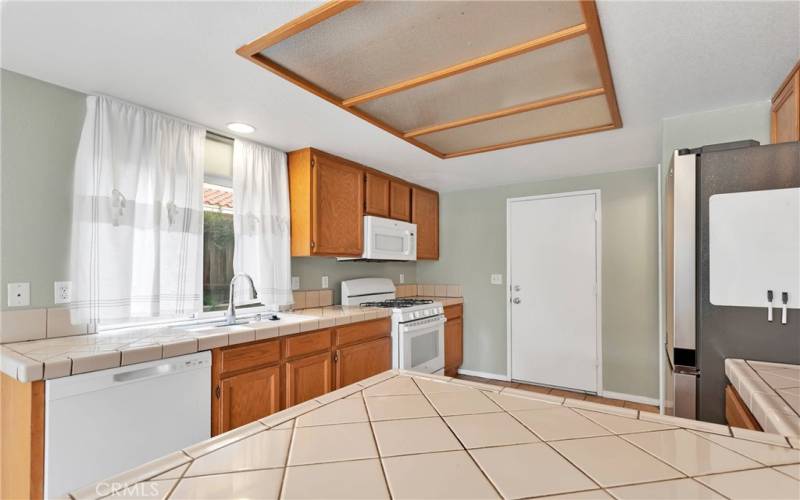 Open and bright kitchen. Large walk-in pantry in kitchen.