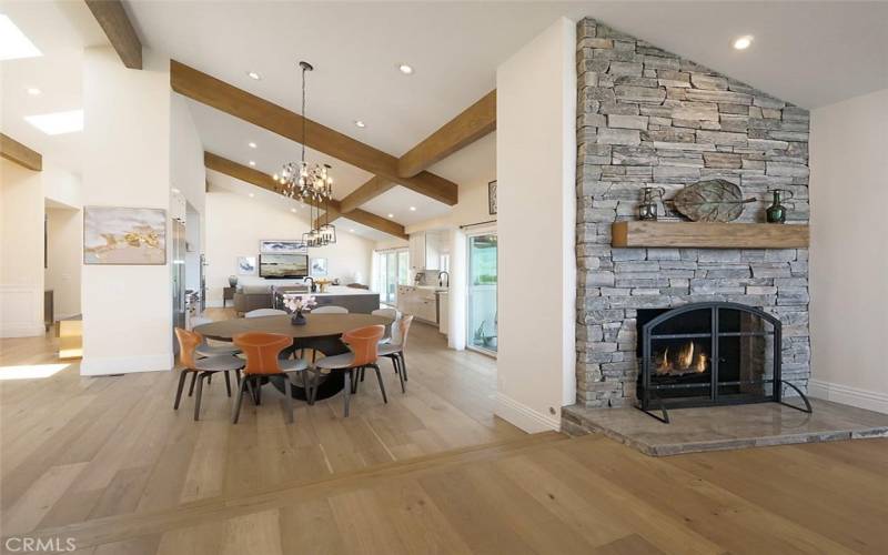 Family Room with Fireplace Opens to Dining & Kitchen