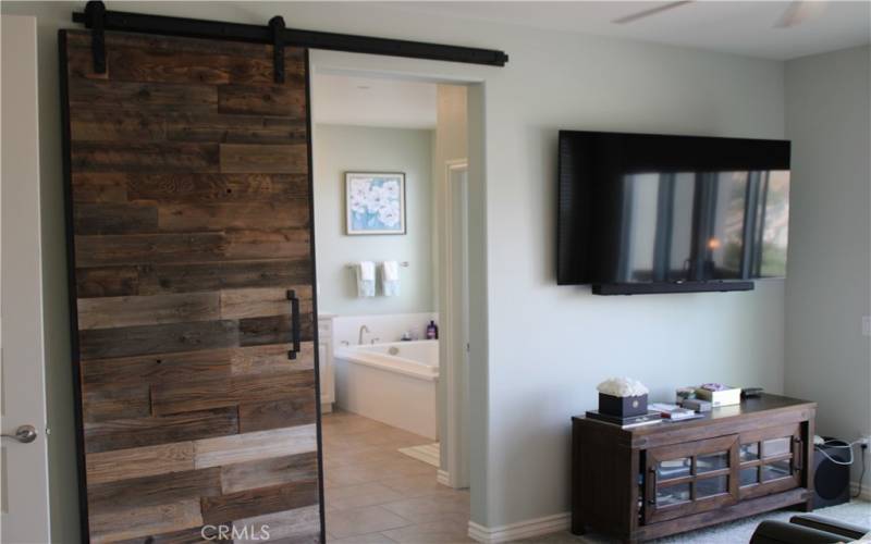 Barn door feature to master bath