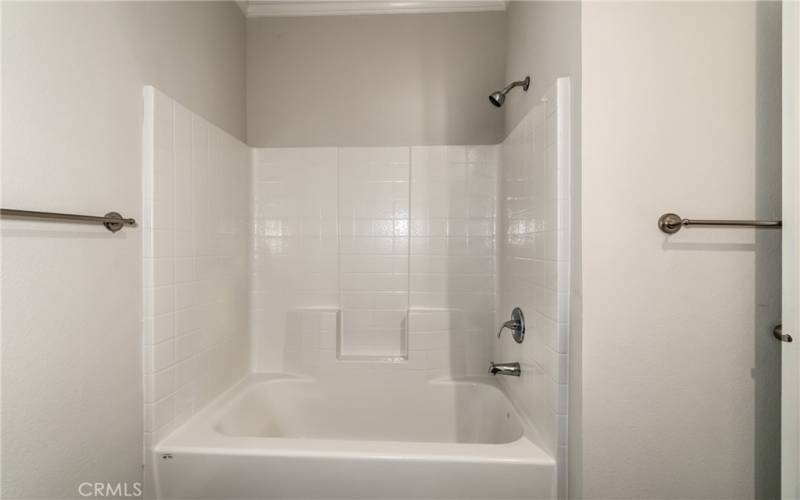 Hall bathroom with tub shower combo