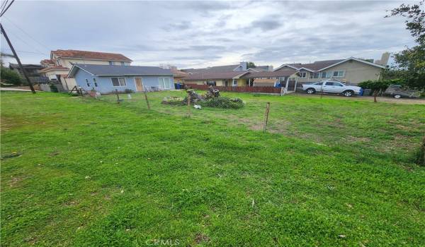 Two home currently on one corner lot in North Grover