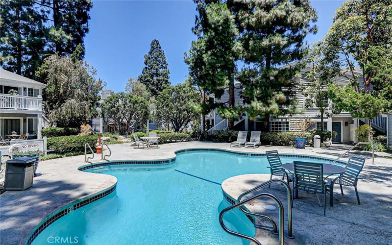 Outdoor lounge area near the pools