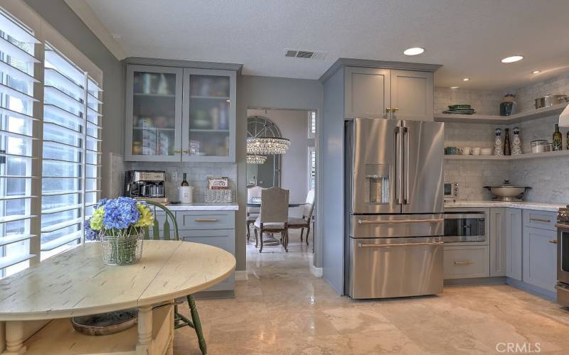 Breakfast nook in kitchen with view of Family room, Dining room and resort-style backyard