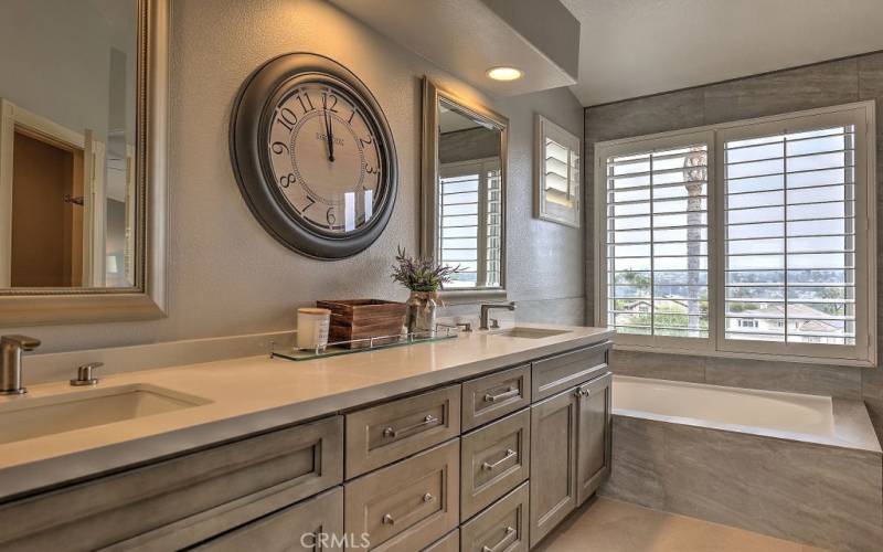 Enjoy this fabulous Master Bathroom Remodel with double sinks and soaking tub