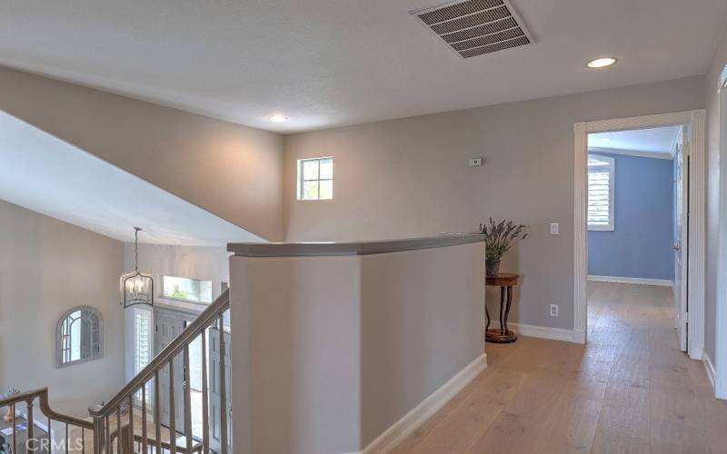 Second floor has beautiful wood floors throughout