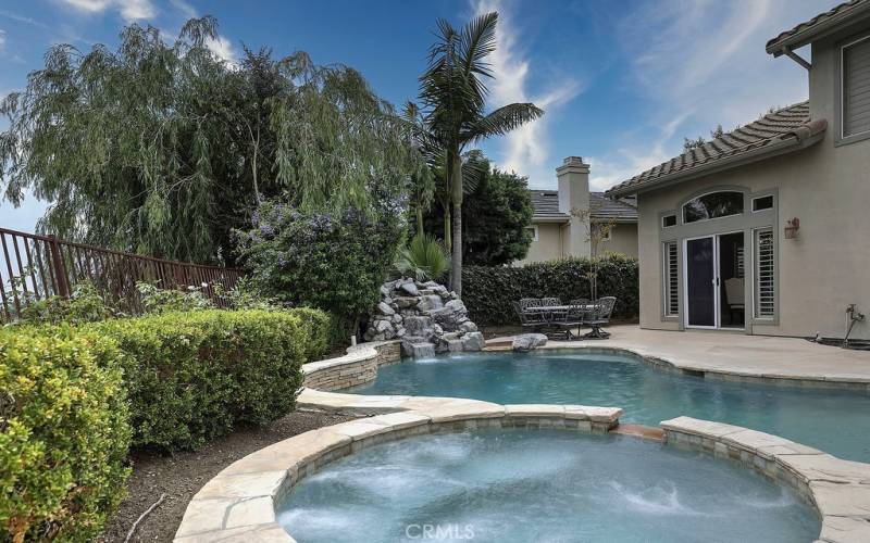 The outdoor spaces are equally impressive, with low-maintenance gardens, water-friendly turf, and the centerpiece is a sparkling pool & spa with stunning waterfall feature