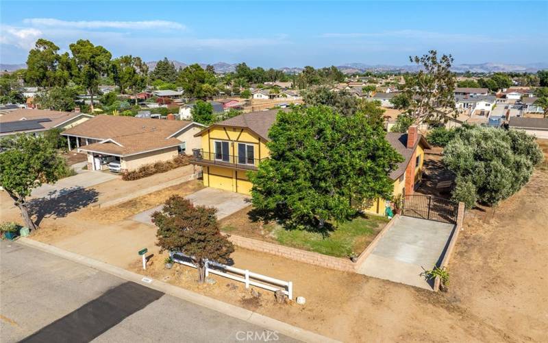 Front of home with driveway to back