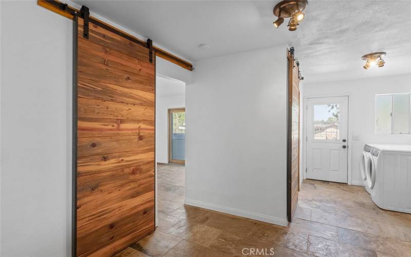 Barn door to downstairs bathroom