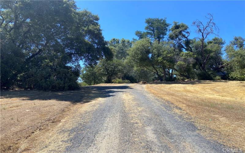 Driveway to the property and house pad.