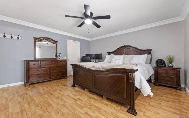 Principle bedroom upstairs, Fan, Lamintad floors, Walk in closet.  Beautiful Crown molding.