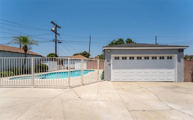 Two car garage with bonus work area in rear