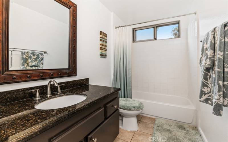 Large full bathroom with shower/tub