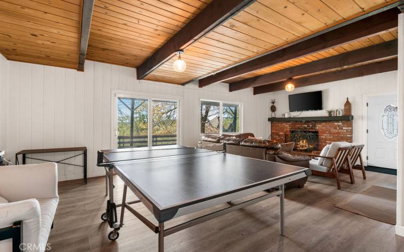 First floor family room with wet bar and fireplace