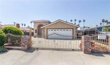 Front of the house with security gate.