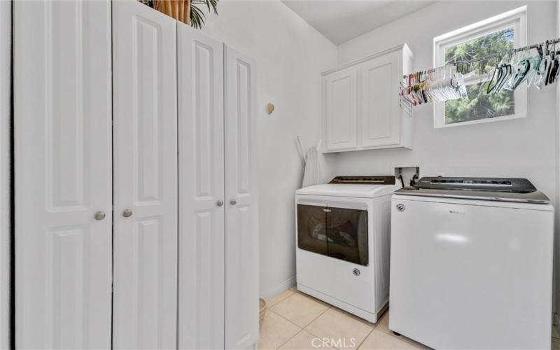 Spacious Laundry Room with plenty of storage space.