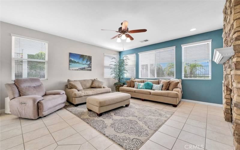 Cozy Family Room with stunning views and fireplace.