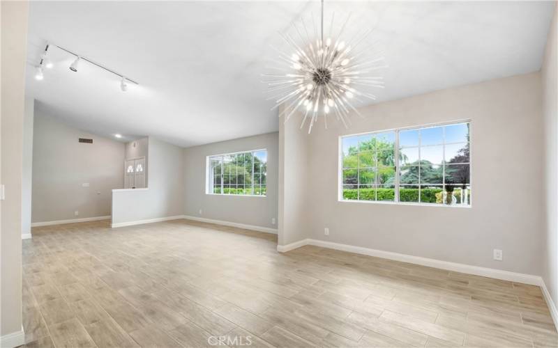 Open Floorplan - Living and Dining rooms with large windows