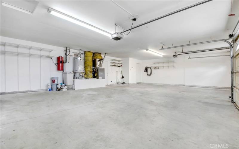 Oversized 3 car garage with garage door openers. Central Vacuum also has an outlet for use in the garage