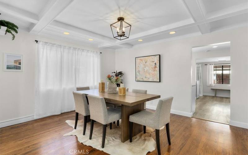 Dining area with coffered ceiling and recessed lights