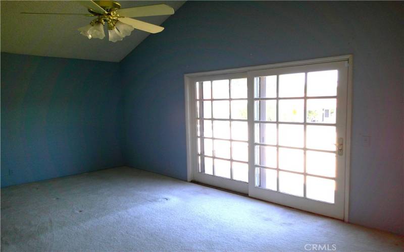 Master Bedroom Slider leading to balcony above garage