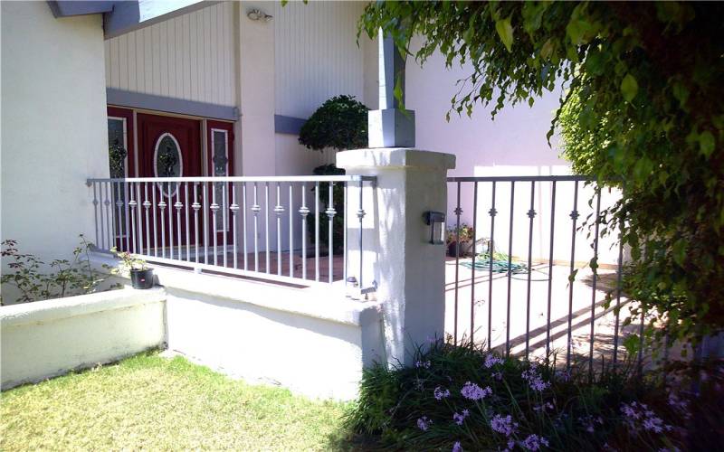 Front fenced-in porch