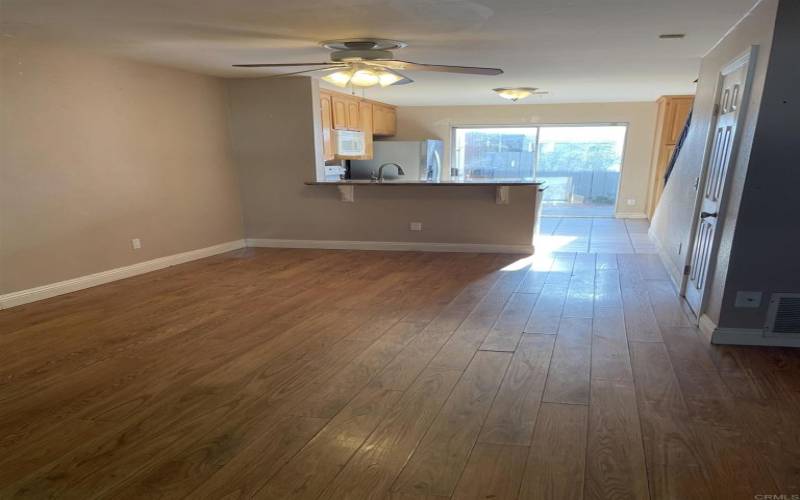 Living room looking toward dining area and kitchen.