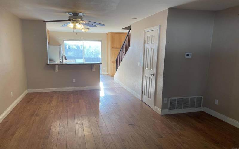 Living room looking toward dining area and kitchen.