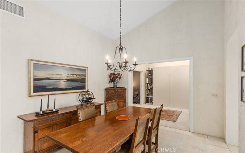 Dining Room opens to  flex space that can be left open or closed off