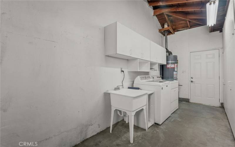 laundry area inside garage