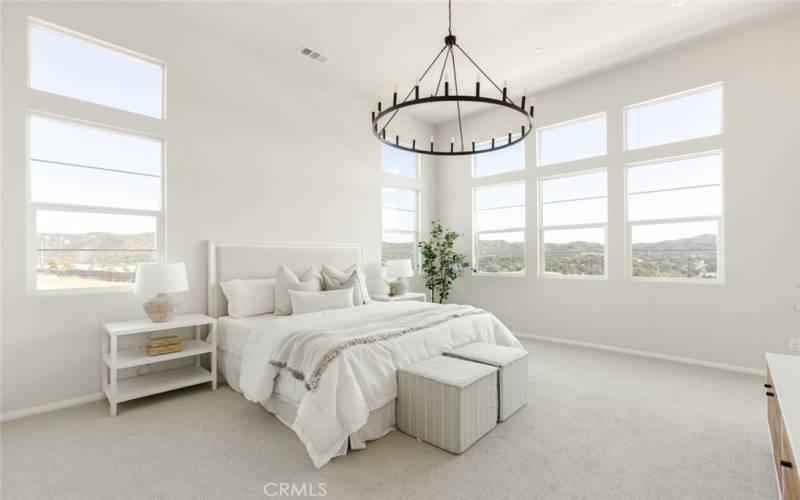 Primary Bedroom with soaring ceilings and panoramic views.