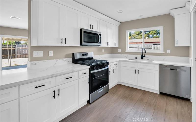 Self closing cabinets and drawers with a breakfast bar