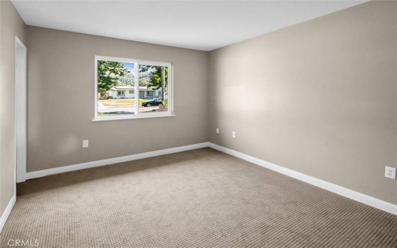 Primary Bedroom with view of mountains