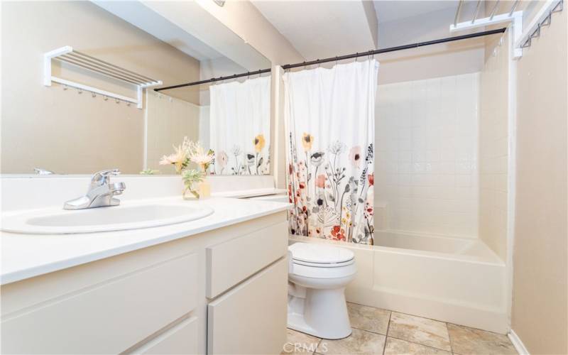 Large second bathroom downstairs with tub/shower.