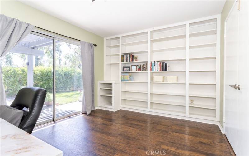 Room #2, with built in bookshelf, room can be used as a library or office.