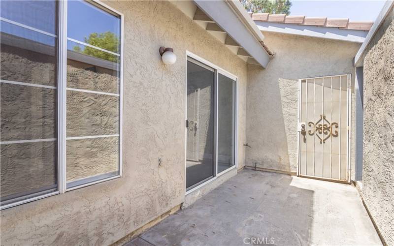 Side patio off eat in kitchen.  Gas hookup for outdoor grill.